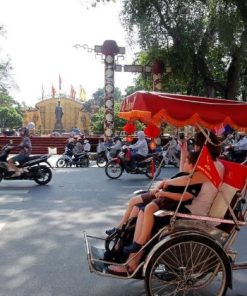 take a cyclo trip to visit hanoi old quarter