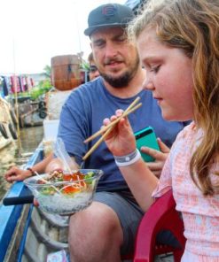 taste local specialty in family trip to mekong delta