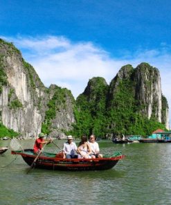 visit halong bay on a rowing boat